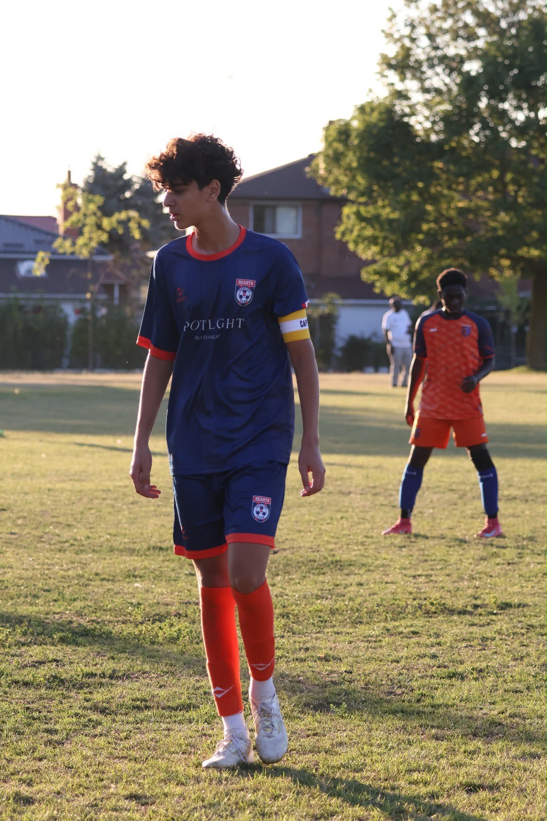 Radin Hajipour, young football captain in Toronto, wearing the captain's armband during Spotlight training